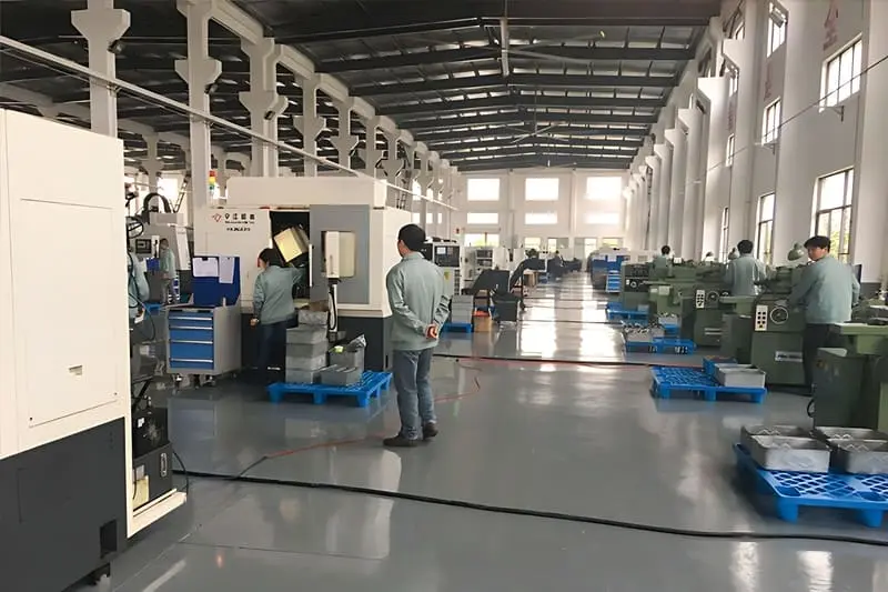 Factory Aisle – Long row of CNC machines for scalable capacity